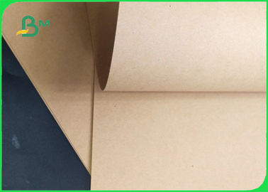 250 / 300 / 300gm Buona resistenza superficiale Gloss Kraft Paper Roll per imballaggio